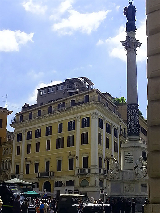 The terrace and its covering seen from the Spanish Steps square